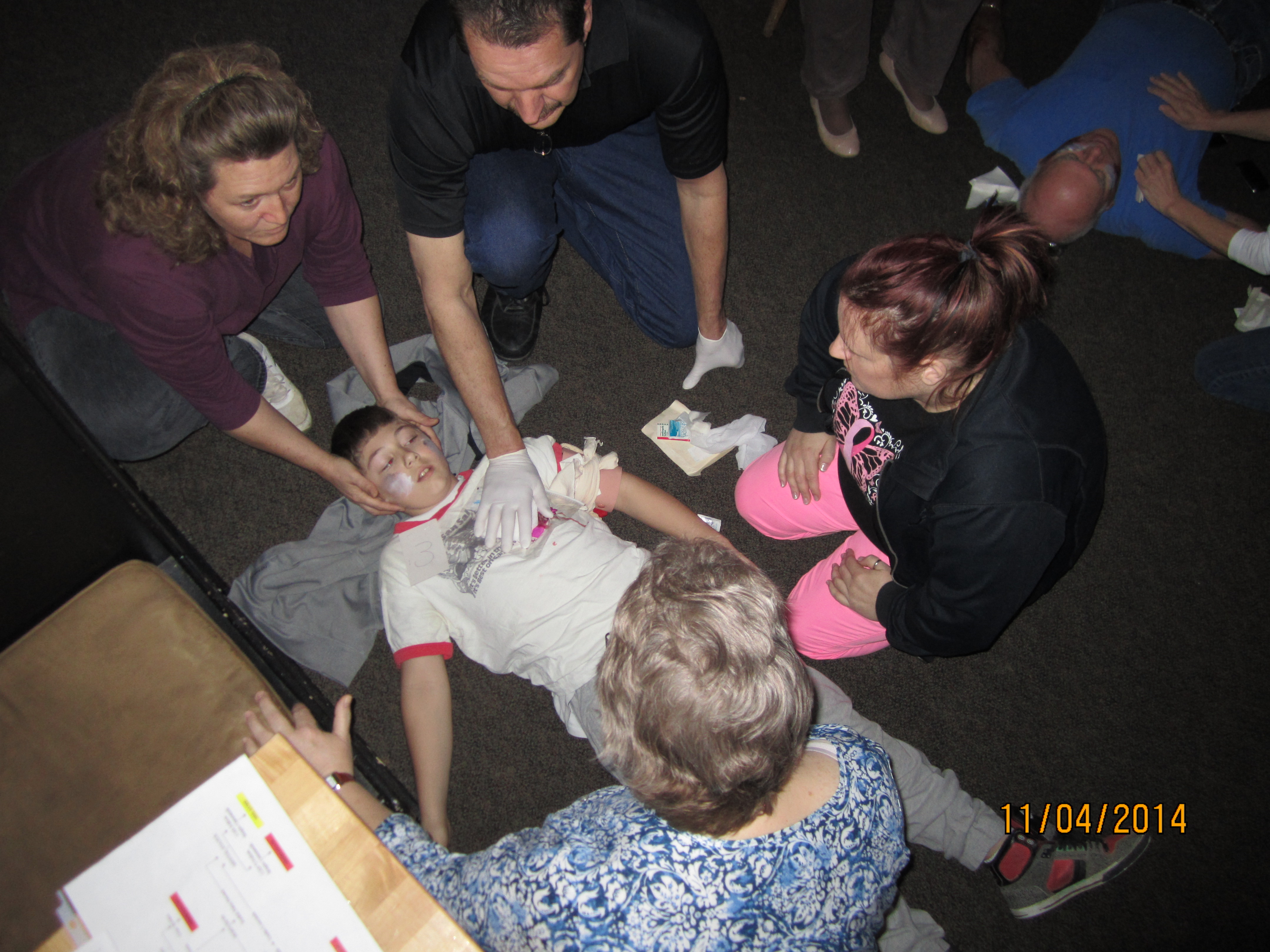 Photo: People providing triage on a patient